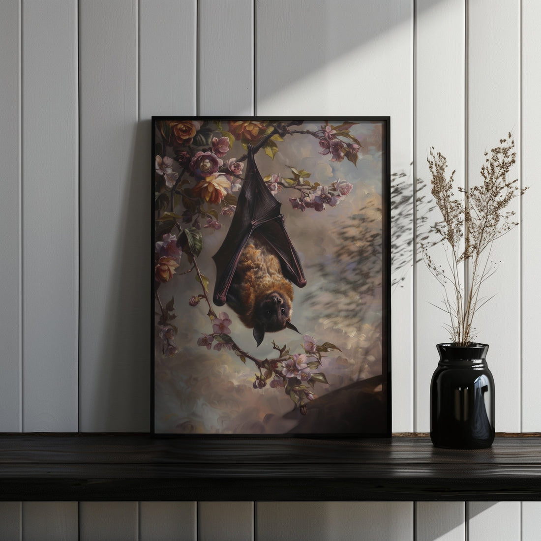 thin black framed gothic bat botanical wall art print on a counter